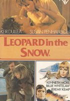 Леопард на снегу